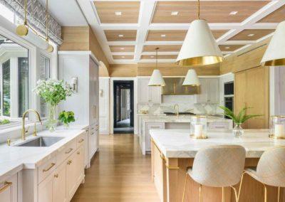 White Kitchen with Gold and Light Wood